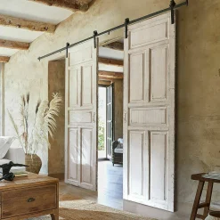 Porta scorrevole a doppia anta Mallothra